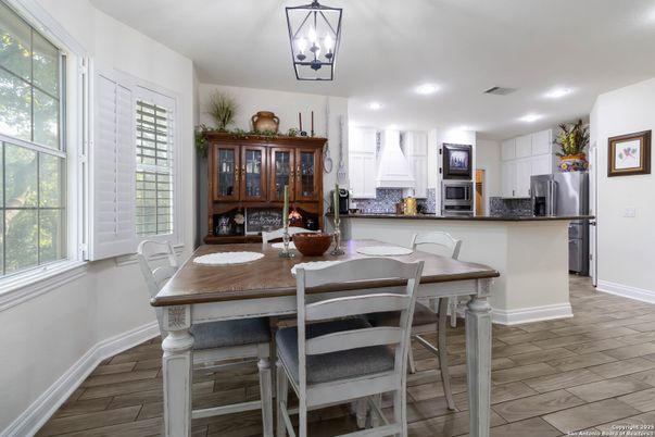 Dining room, Interior, Kitchen, Recessed Lighting, Stainless Steel Appliances, Wood Texture Flooring