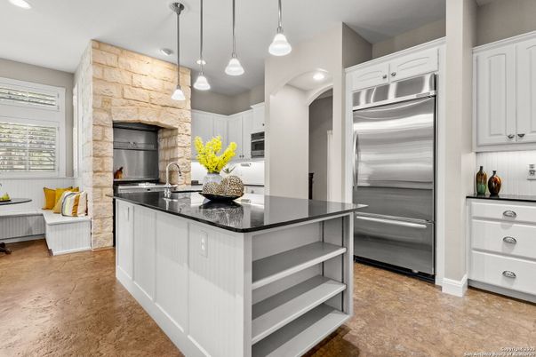Interior, Kitchen, Pendant Lights, Recessed Lighting, Stainless Steel Appliances, Stone Walls