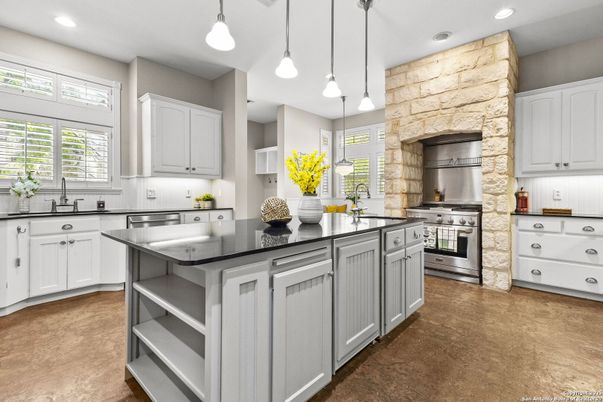 Interior, Kitchen, Pendant Lights, Recessed Lighting, Stainless Steel Appliances, Stone Walls