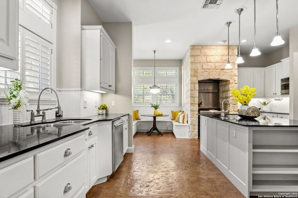 Interior, Kitchen, Pendant Lights, Recessed Lighting, Stainless Steel Appliances, Stone Walls
