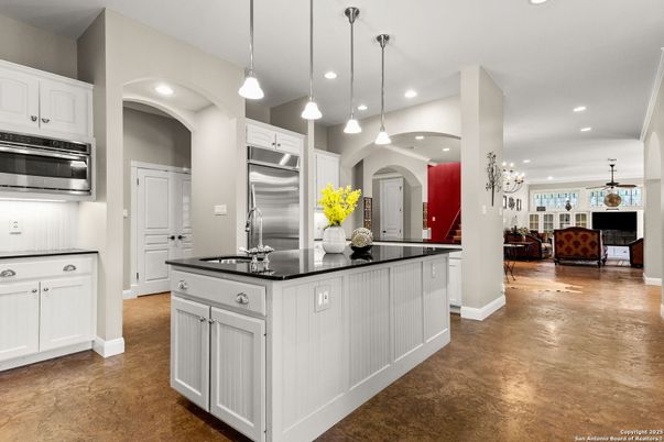 Chandelier, Interior, Kitchen, Pendant Lights, Recessed Lighting, Stainless Steel Appliances, Wood Texture Flooring