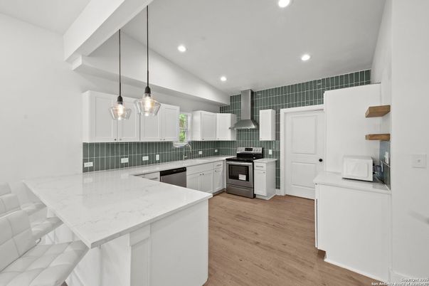 Interior, Kitchen, Pendant Lights, Recessed Lighting, Stainless Steel Appliances, Wood Texture Flooring