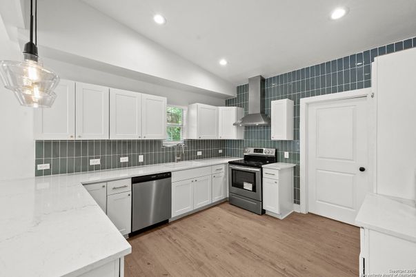 Interior, Kitchen, Pendant Lights, Recessed Lighting, Stainless Steel Appliances, Wood Texture Flooring