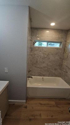 Bathroom, Interior, Marble Walls, Recessed Lighting, Wood Texture Flooring