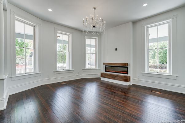 Chandelier, Empty room, Fireplace, Interior, Recessed Lighting, Wood Texture Flooring