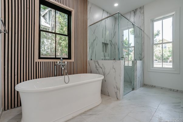 Bathroom, Free Standing Baths, Glass Shower, Interior, Marble, Marble Walls, Recessed Lighting