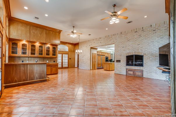 Empty room, Fireplace, Interior, Kitchen, Pendant Lights, Recessed Lighting, Stone Walls