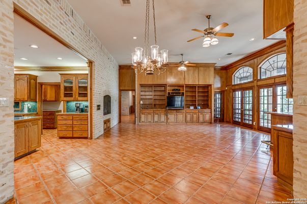 Chandelier, Fireplace, Interior, Recessed Lighting, Stone Walls