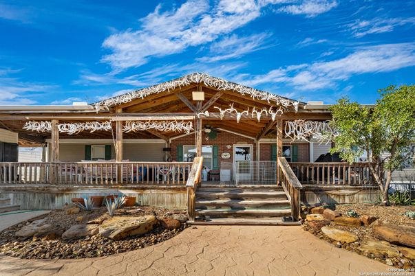 Exterior, Facade, Brick Facade, Log Home
