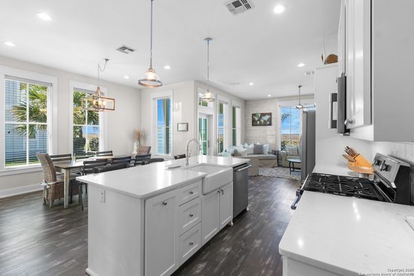 Dining room, Interior, Kitchen, Living room, Pendant Lights, Recessed Lighting, Stainless Steel Appliances, Wood Texture Flooring