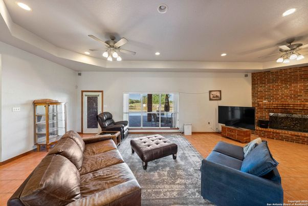 Fireplace, Interior, Living room, Recessed Lighting, Stone Walls
