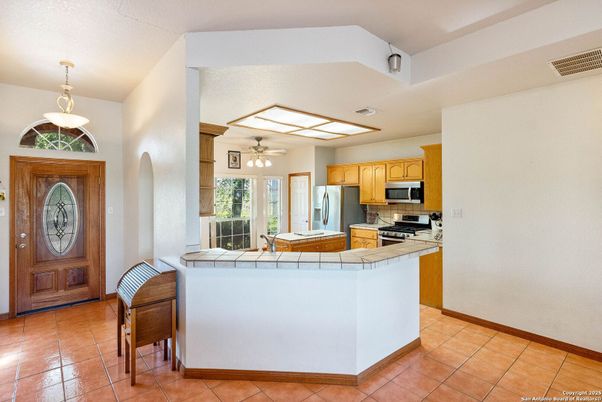 Interior, Kitchen, Pendant Lights, Tile Countertops