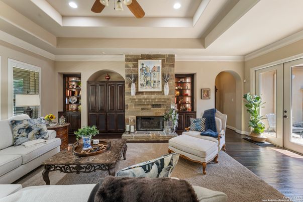 Fireplace, Interior, Living room, Recessed Lighting, Stone Walls, Wood Texture Flooring