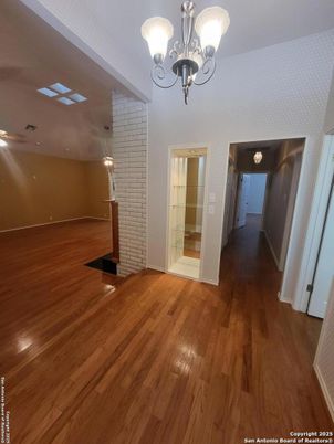 Chandelier, Empty room, Interior, Stone Walls, Wood Texture Flooring