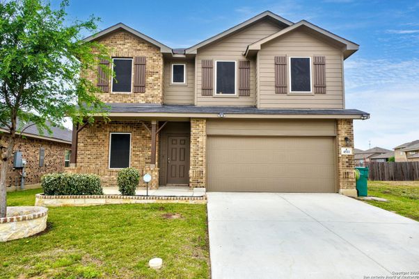 Attached, Exterior, Facade, Brick Facade, American Craftsman