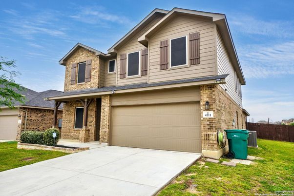 Attached, Exterior, Facade, Brick Facade, American Craftsman