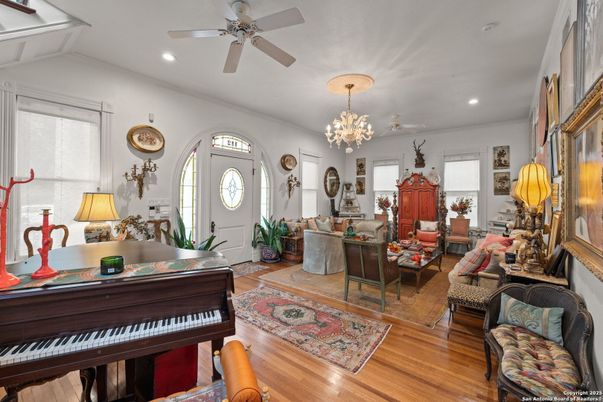 Chandelier, Interior, Living room, Piano, Recessed Lighting, Wood Texture Flooring