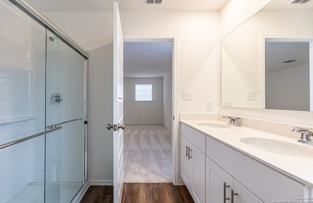 Bathroom, Dual Sink Vanities, Glass Shower, Interior, Wood Texture Flooring