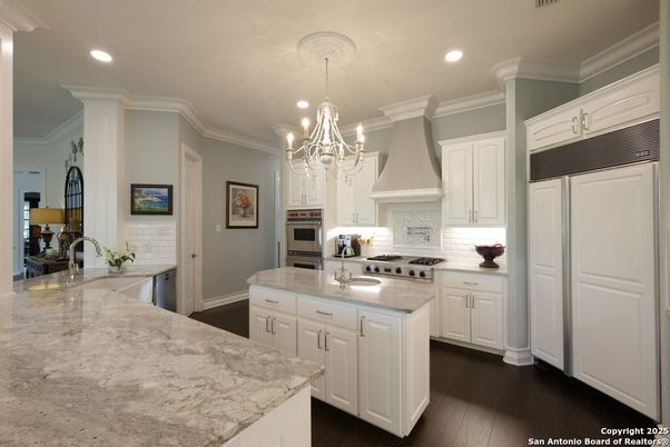 Chandelier, Interior, Kitchen, Recessed Lighting, Stainless Steel Appliances, Wood Texture Flooring