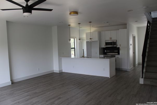 Interior, Kitchen, Pendant Lights, Recessed Lighting, Stainless Steel Appliances, Wood Texture Flooring