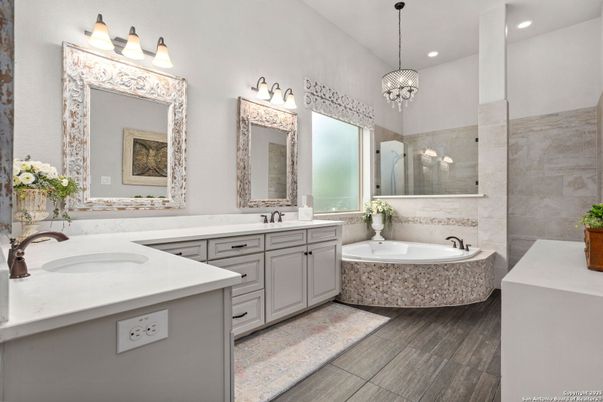 Bathroom, Dual Sink Vanities, Interior, Pendant Lights, Recessed Lighting, Wood Texture Flooring