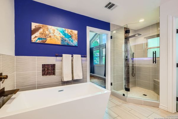 Bathroom, Free Standing Baths, Glass Shower, Interior, Recessed Lighting, Wood Texture Flooring