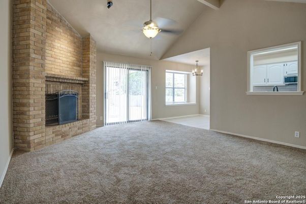 Chandelier, Empty room, Fireplace, Interior, Pendant Lights, Stone Walls