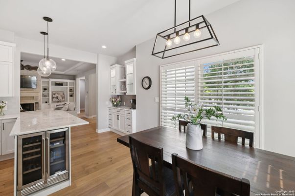 Dining room, Fireplace, Interior, Pendant Lights, Recessed Lighting, Wood Texture Flooring