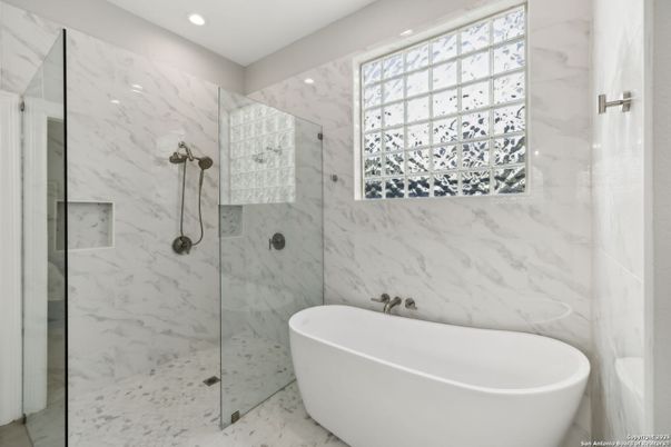 Bathroom, Free Standing Baths, Glass Shower, Interior, Marble Walls, Recessed Lighting