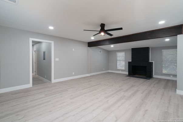 Empty room, Fireplace, Interior, Recessed Lighting, Wood Texture Flooring