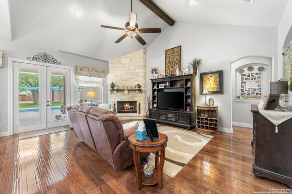 Fireplace, Interior, Living room, Recessed Lighting, Stone Walls, Wooden Beams, Wood Texture Flooring