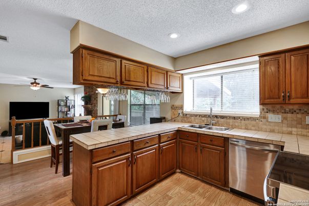 Dining room, Interior, Kitchen, Recessed Lighting, Tile Countertops, Wood Texture Flooring