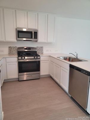Interior, Kitchen, Stainless Steel Appliances, Wood Texture Flooring