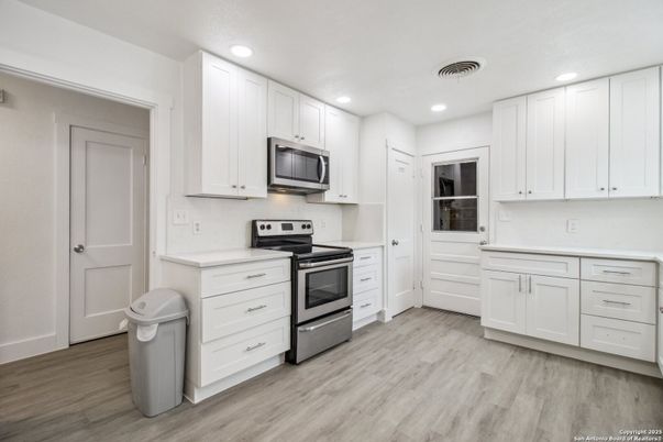 Interior, Kitchen, Recessed Lighting, Stainless Steel Appliances, Wood Texture Flooring