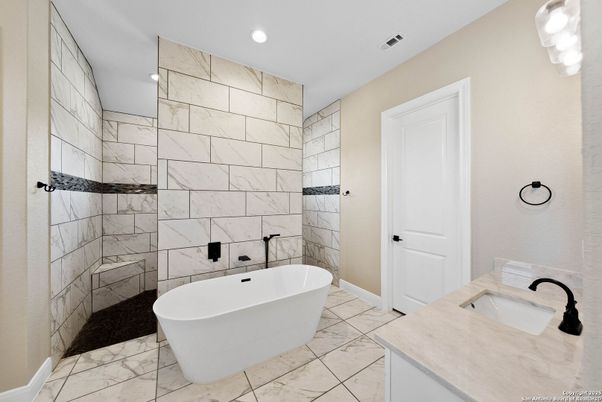 Bathroom, Dual Sink Vanities, Free Standing Baths, Interior, Marble, Marble Walls, Recessed Lighting