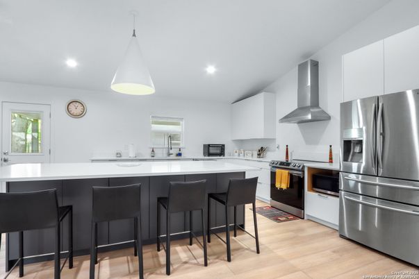 Interior, Kitchen, Pendant Lights, Recessed Lighting, Stainless Steel Appliances, Wood Texture Flooring