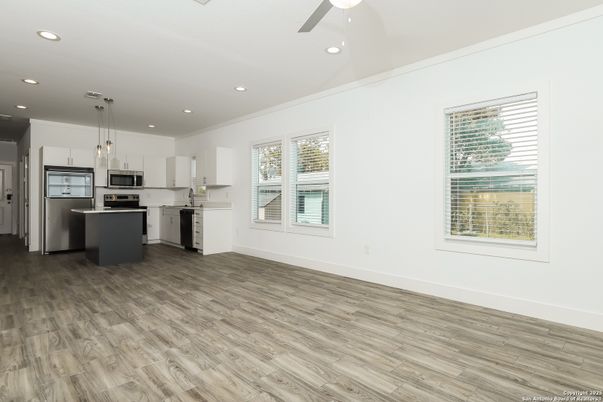Interior, Kitchen, Pendant Lights, Recessed Lighting, Stainless Steel Appliances, Wood Texture Flooring