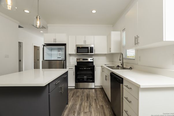 Interior, Kitchen, Pendant Lights, Recessed Lighting, Stainless Steel Appliances, Wood Texture Flooring