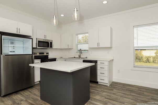 Interior, Kitchen, Pendant Lights, Recessed Lighting, Stainless Steel Appliances, Wood Texture Flooring