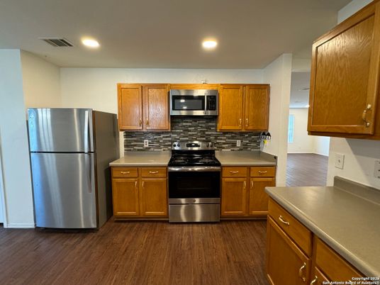 Interior, Kitchen, Recessed Lighting, Stainless Steel Appliances, Wood Texture Flooring