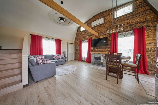 Dining room, Fireplace, Interior, Living room, Pendant Lights, Wooden Beams, Wood Texture Flooring