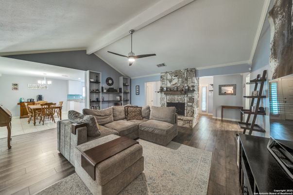 Chandelier, Dining room, Fireplace, Interior, Living room, Recessed Lighting, Wood Texture Flooring