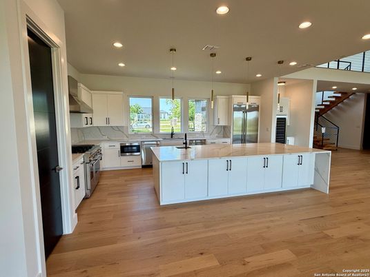 Interior, Kitchen, Pendant Lights, Recessed Lighting, Stainless Steel Appliances, Wood Texture Flooring