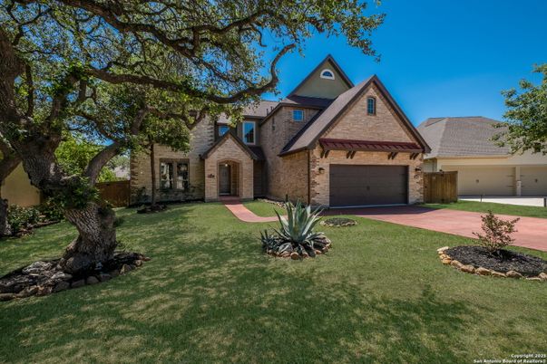 Attached, Backyard, Exterior, Facade, Brick Facade, Brick Traditional