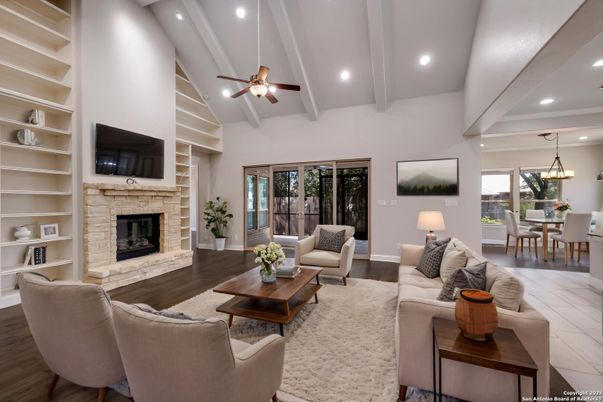 Dining room, Fireplace, Interior, Living room, Pendant Lights, Recessed Lighting, Wood Texture Flooring