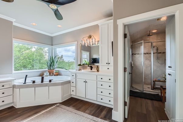 Bathroom, Dual Sink Vanities, Glass Shower, Interior, Recessed Lighting, Wood Texture Flooring