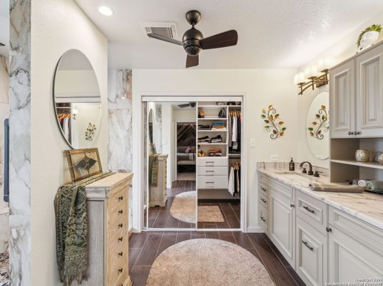 Bathroom, Dual Sink Vanities, Interior, Recessed Lighting, Walk-in Closets, Wood Texture Flooring