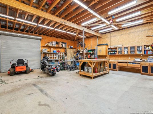 Garage, Interior, Stone Walls, Wooden Beams
