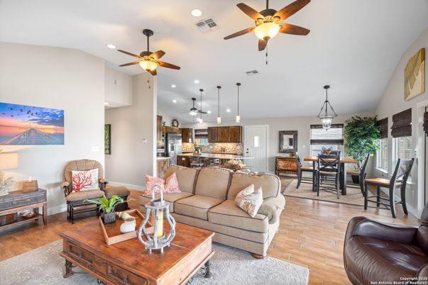 Dining room, Interior, Kitchen, Living room, Pendant Lights, Recessed Lighting, Stainless Steel Appliances, Wood Texture Flooring