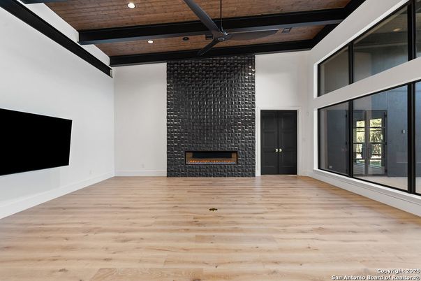 Empty room, Fireplace, Interior, Recessed Lighting, Wooden Beams, Wooden Ceilings, Wood Texture Flooring